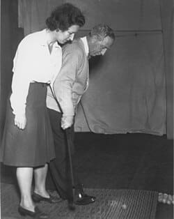Ernest Jones teaching golf